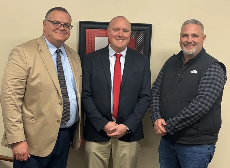 United CUSD 304 Superintendent Tom Hawkins, incoming principal Michael Washabaugh, and board president Scott Campbell