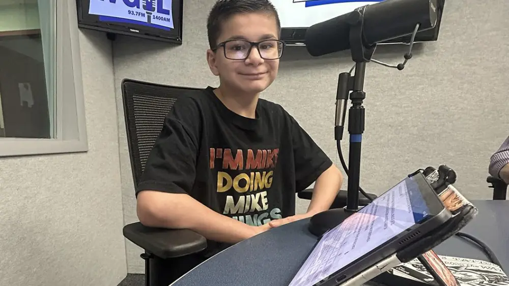 Michael Knight at the microphone at WGIL studios, April 15, 2026