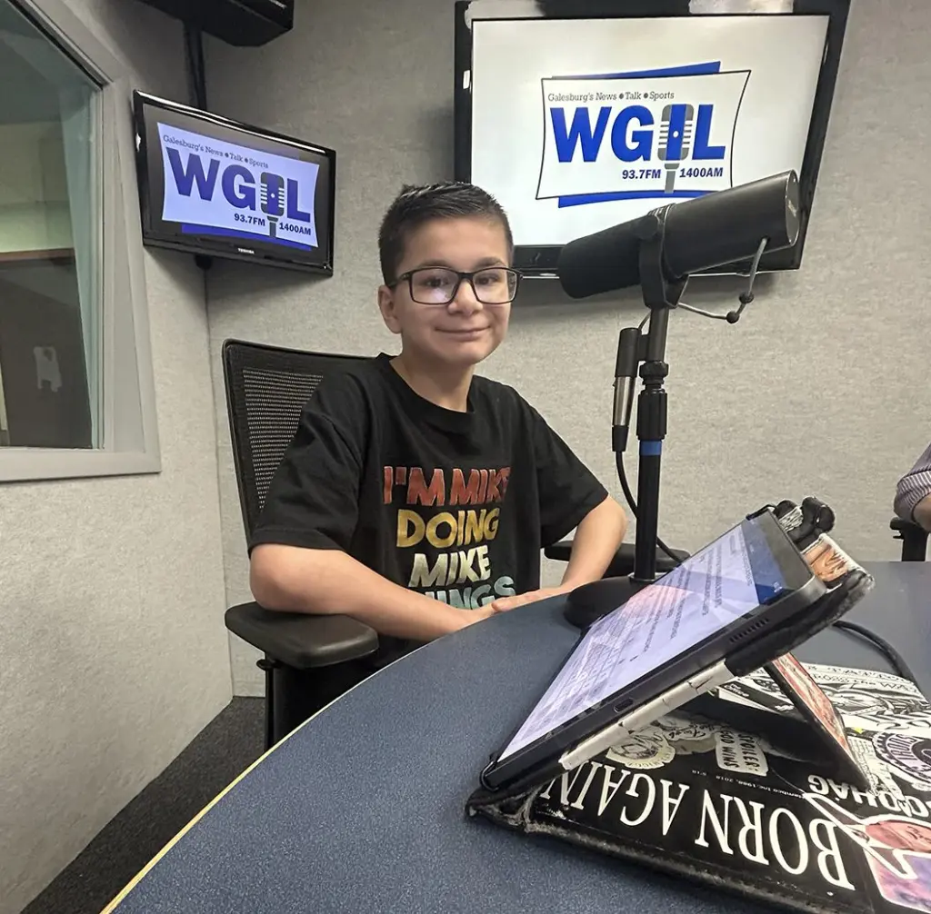 Michael Knight at the microphone at WGIL studios, April 15, 2026