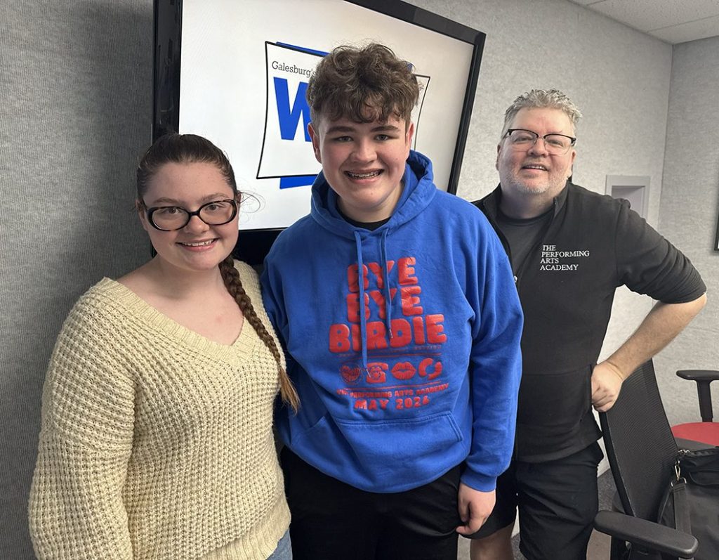 Performing Arts Academy director Tim Holmes and cast members Mallory Fineran and Dean McNally at WGIL in Galesburg, Illinois, April 28, 2026.