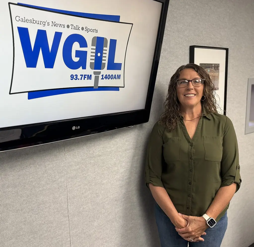 Kathy Walker, market manager for the Galesburg Farmers Market, poses in the WGIL studios in Galesburg, Illinois