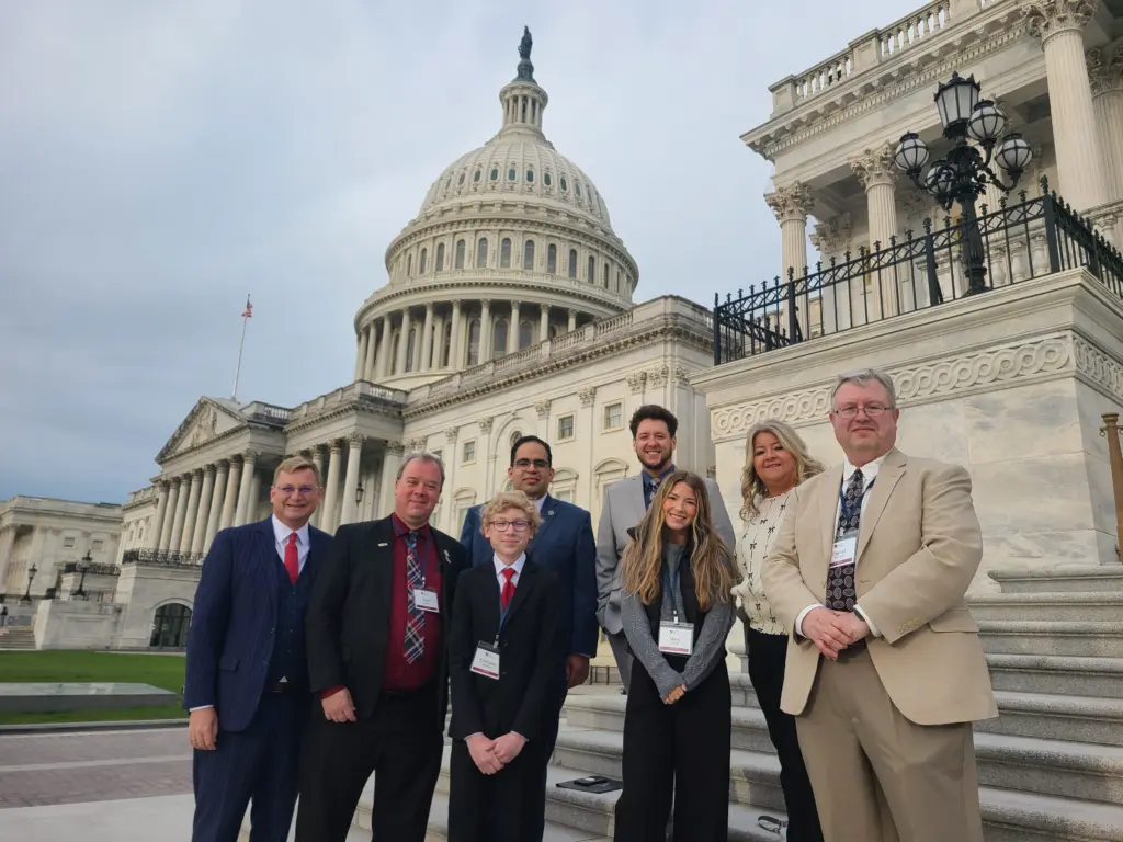 Illinois county clerk delegation poses outside the U.S. Capitol in Washington, D.C., on April 28, 2026