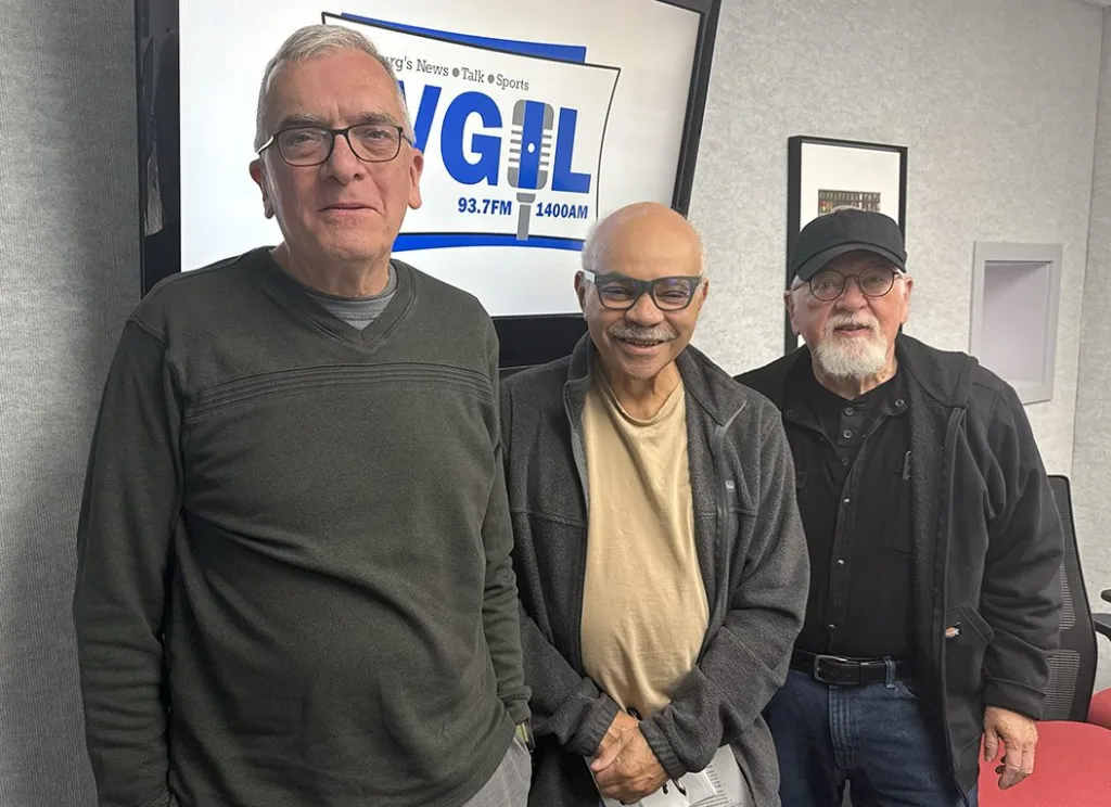 Jeff Douglas, Wendel Hunigan, and Bobby Dillard of the Friends of the Galesburg Public Library in the WGIL studios in Galesburg, Illinois