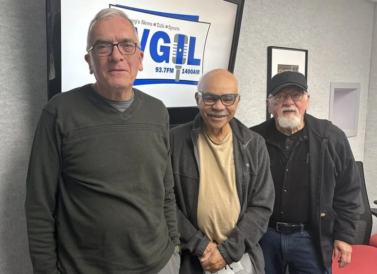 Jeff Douglas, Wendel Hunigan, and Bobby Dillard of the Friends of the Galesburg Public Library in the WGIL studios in Galesburg, Illinois