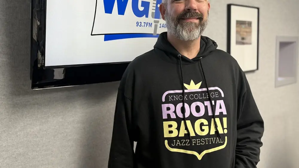 Andy Crawford, organizer of the Rootabaga Jazz Festival at Knox College, poses in the WGIL studios in Galesburg, Illinois