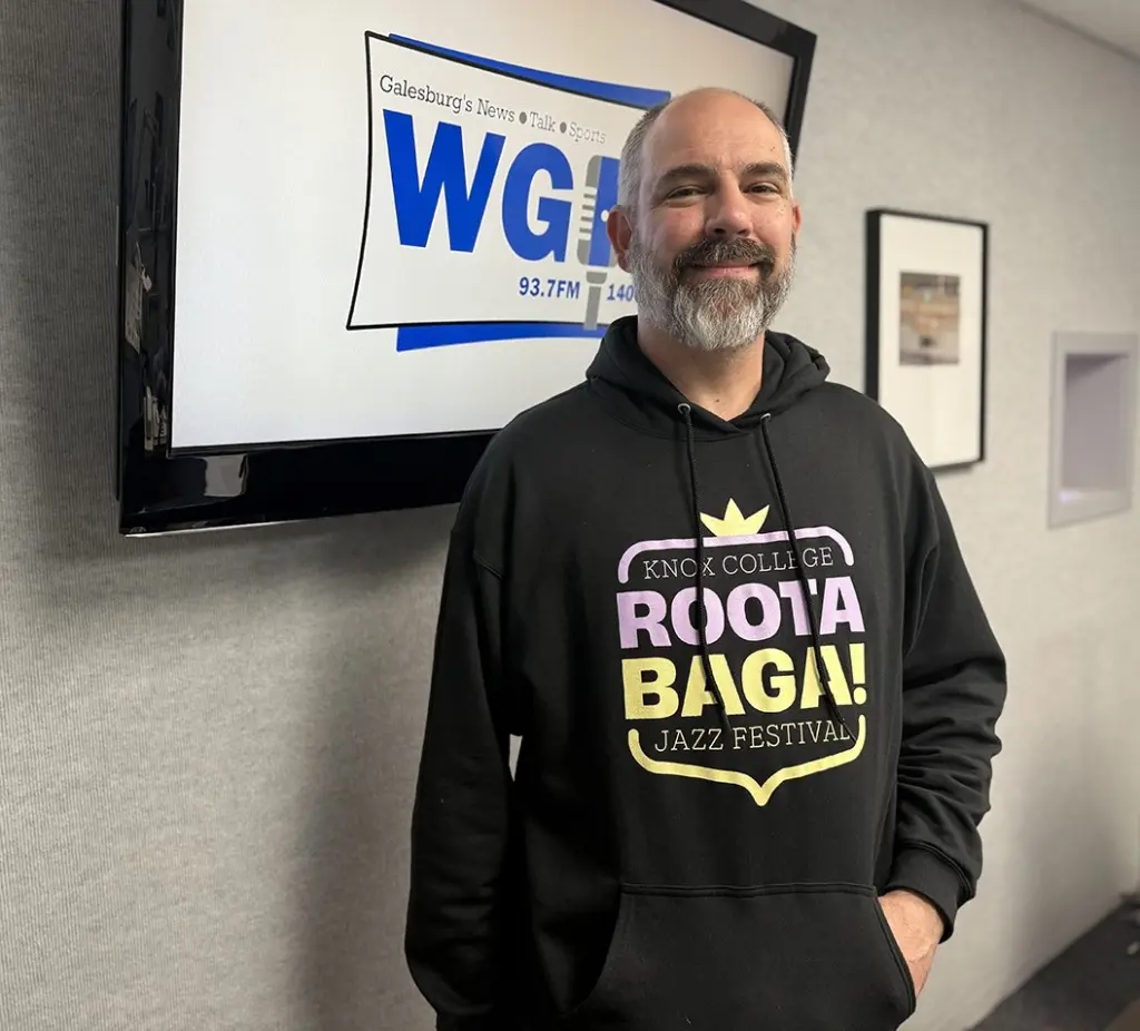 Andy Crawford, organizer of the Rootabaga Jazz Festival at Knox College, poses in the WGIL studios in Galesburg, Illinois