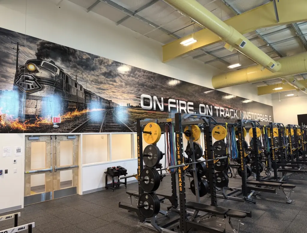 New weight room at Galesburg High School featuring 16 stations and individualized training programs