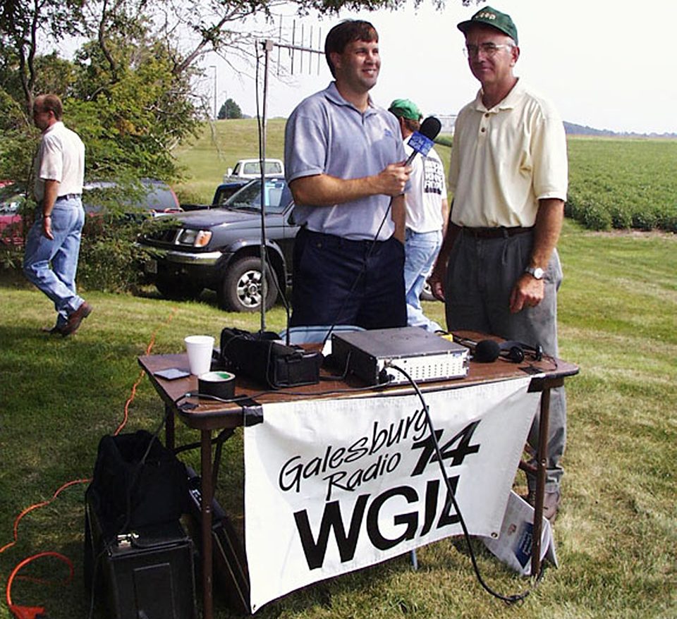 Ted Mottaz and WGIL farm director Jim Lee at an outdoor ag event, 2002
