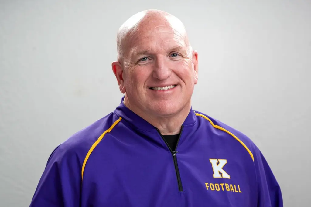 Andy Gibbons in a Knox College football pullover, retirement photo 2025-26