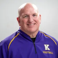 Andy Gibbons in a Knox College football pullover, retirement photo 2025-26