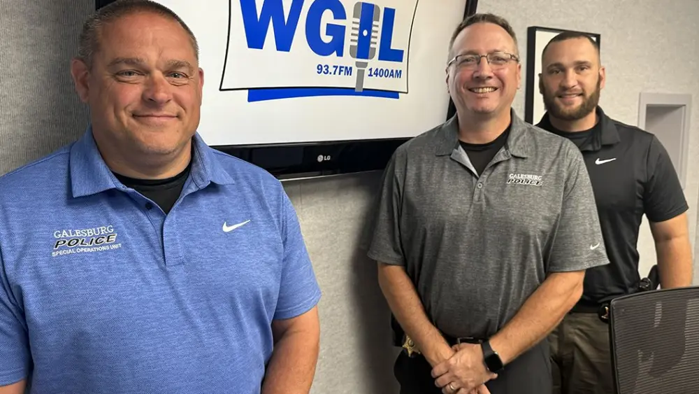 Galesburg Police Officer Mike Ingles, Chief Kevin Legate, and Officer Jake Taylor at WGIL, June 2026