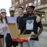 2026 Taste of Galesburg: Friends share a pizza at the 40th Taste of Galesburg, Thursday, July 16, 2026. (Photo courtesy STEVE DAVIS/SeedCo Media)