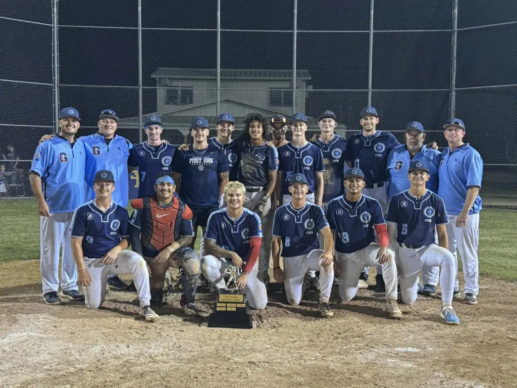 Galesburg Post 285 baseball team poses with the Third Division championship trophy after winning the tournament.