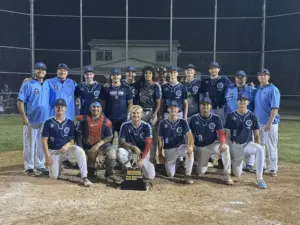 Galesburg Post 285 baseball team poses with the Third Division championship trophy after winning the tournament.