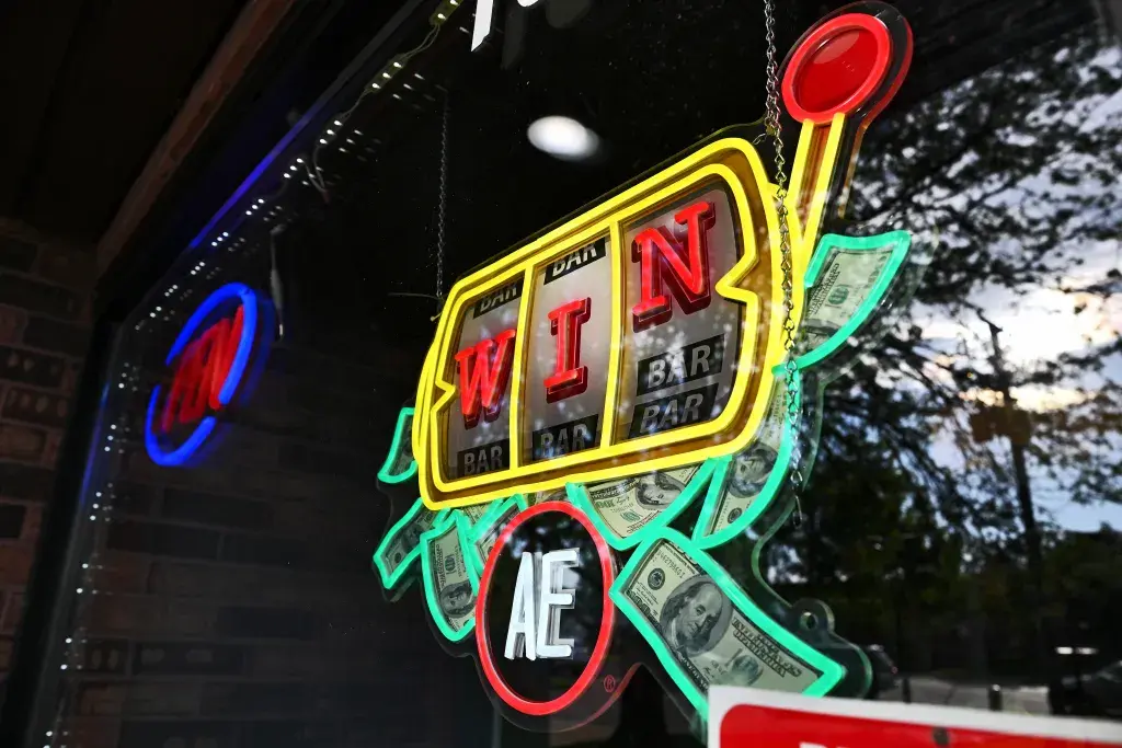 A sign advertises slot machines at a video gaming cafe in west suburban Oakbrook Terrace.