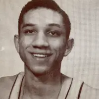 Black-and-white yearbook photo of a young Al Williams in his Galesburg High School basketball uniform