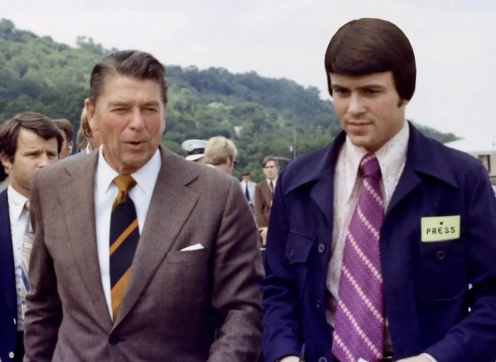 Ken Johnson as a young reporter walking with President Ronald Reagan
