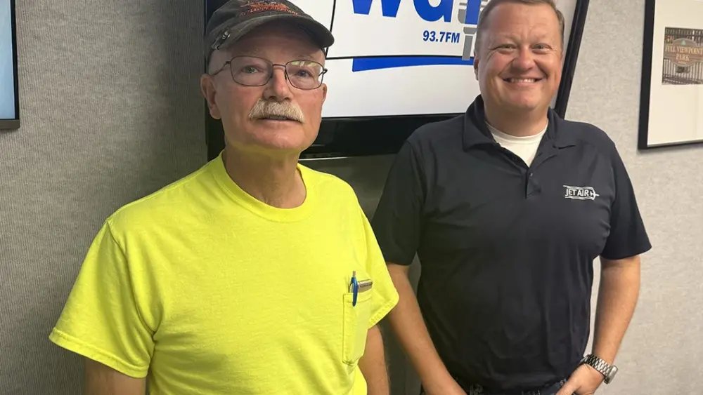 Tye Hammerle and Phillip Wolford standing together in the WGIL studio