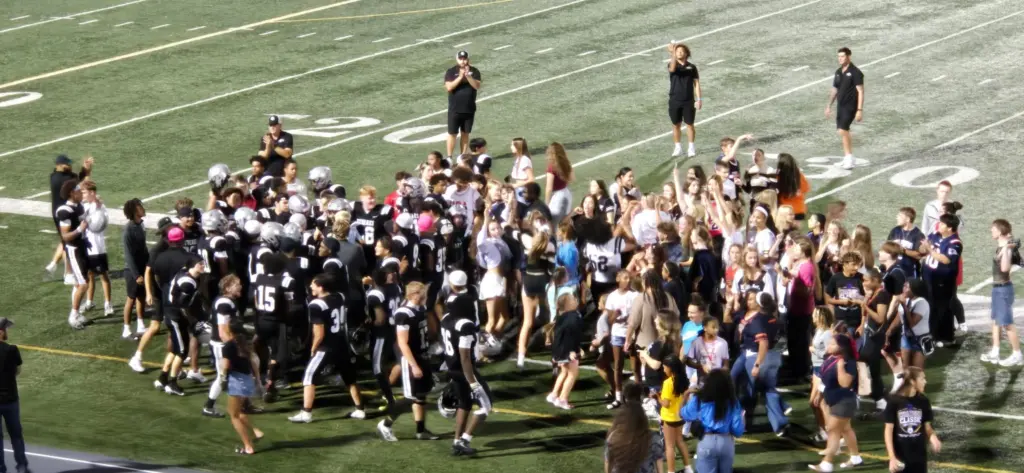 GHS Silver Streaks football celebrates with their fans 9/11/26