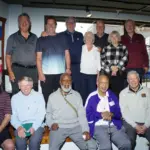 barry-swanson-book-signing-2: Members of the 1965-66 Silver Streaks team and others gather at Barry Swanson's book signing Wednesday at Wordsmith Bookshoppe. Back row from left: Zack Thiel, Mark Thiel, Barry Swanson, his wife Gail Swanson, Cathy Stone Finley and Frank Dexter. Front row from left: Pete Nyman, Steve Marshall, Roland McDougald, Dale Kelley and Steve Ballard. (Photo courtesy Tom Foley)