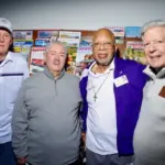 barry-swanson-group-dale-kelley: Dale Kelley (purple jacket) with others at Wednesday's book signing at Wordsmith Bookshoppe. (Photo courtesy Tom Foley)
