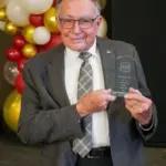 john-schlaf-five-over-40-2026: John Schlaf holds his 2026 Five Over 40 award at the Galesburg Area Chamber of Commerce's Evening of Excellence. (Photo provided)