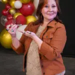 mandy-balser-five-over-40-2026: Mandy Balser holds her 2026 Five Over 40 award at the Galesburg Area Chamber of Commerce's Evening of Excellence. (Photo provided)