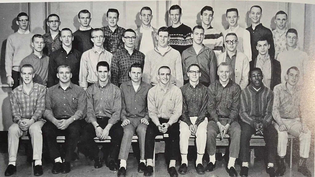 Alt text: Yearbook group photo of about 28 Galesburg High School Boys Forum members in three rows, wearing button-down shirts and sweaters