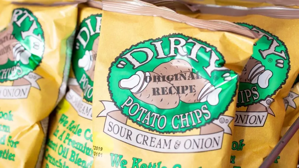 A view of several bags of Utz Dirty Sour Cream and Onion flavor potato chips^ at the store. Los Angeles^ California^ United States - 09-04-2019