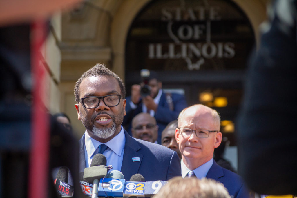Chicago Mayor-elect Brandon Johnson speaks to reporters outside of the Illinois State Capitol Wednesday after addressing a joint session of the General Assembly. Also pictured is Senate President Don Harmon. (Capitol News Illinois photo by Jerry Nowicki)