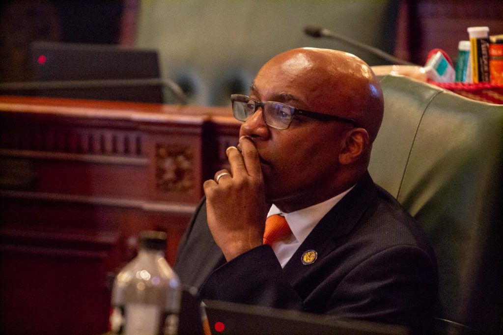 Democratic Attorney General Kwame Raoul sits on the House floor as lawmakers debate an initiative of his office that would allow individuals and the attorney general to sue crisis pregnancy centers if they engage in deceptive practices. (Capitol News Illinois photo by Jerry Nowicki) 