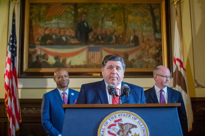 Gov. JB Pritzker, House Speaker Emanuel "Chris" Welch and Senate President Don Harmon appear for a rare joint news conference on Wednesday in the Capitol to announce a budget framework for next year. (Capitol News Illinois photo by Jerry Nowicki)