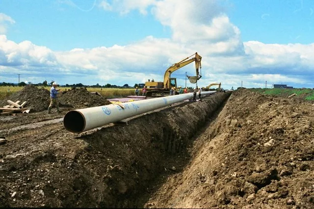 Pipe laying at Raheny, Co. Dublin Preparing to lay pipe into trench at Raheny, Lusk, on the Bord Gáis Interconnector pipeline from Loughshinney to Ballough. (Credit: Kieran Campbell)