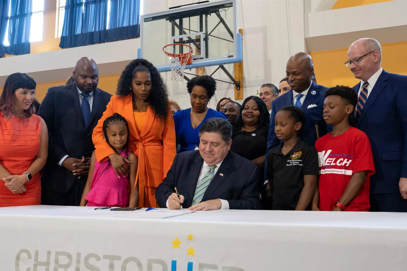 Gov. JB Pritzker signs the Fiscal Year 2024 state budget into law Wednesday. (Capitol News Illinois photo by Andrew Adams)