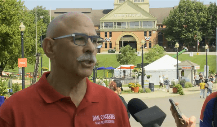 State Rep. Dan Caulkins, R-Decatur, holds a news conference at the Illinois State Fair Friday after the state Supreme Court sided against him by ruling that the state's ban on "assault weapons" does not run afoul of the state constitution. (Credit: Blueroomstream.com)