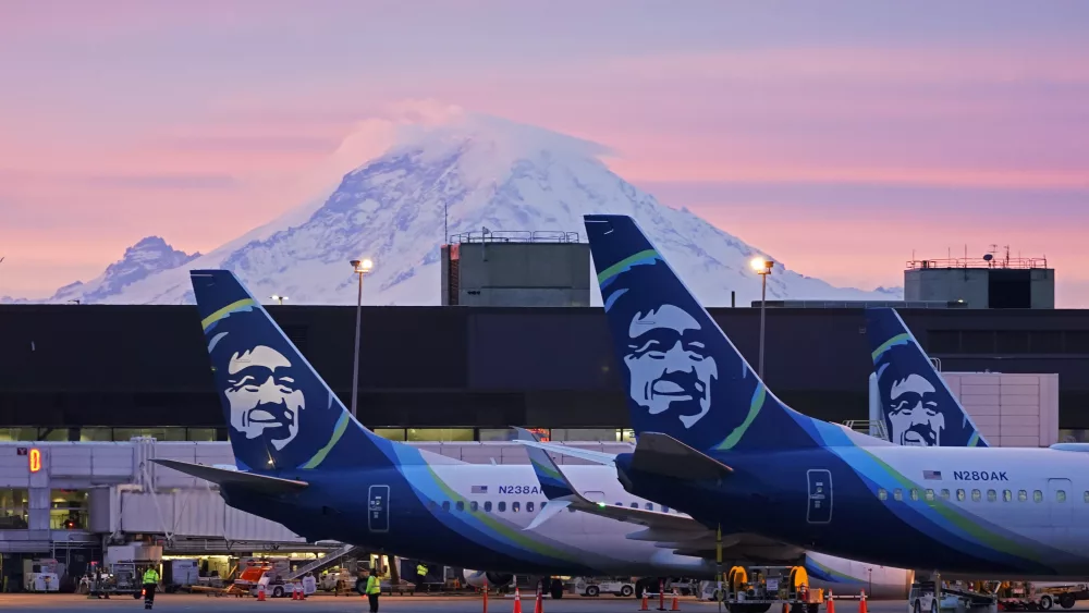 Alaska Airlines planes by Mt. Rainier