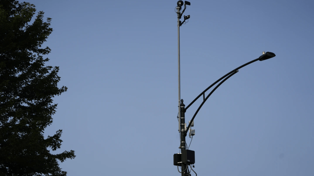 ShotSpotter equipment overlooks the intersection of South Stony Island Avenue and East 63rd Street in Chicago on Aug. 10, 2021. (AP Photo/Charles Rex Arbogast, file)