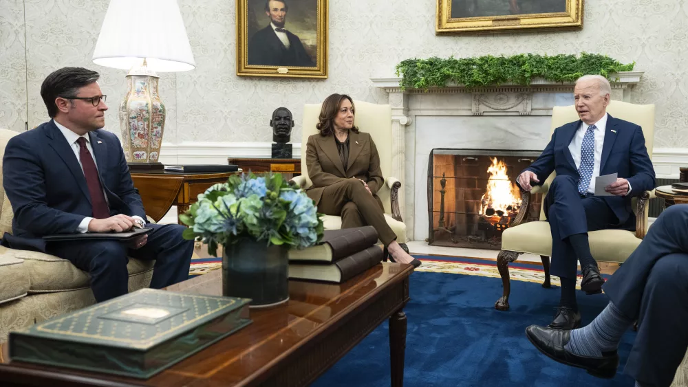 President Joe Biden speaks during a meeting with Congressional leaders in the Oval Office of the White House, Tuesday, Feb. 27, 2024, in Washington. From left, Speaker of the House Mike Johnson of La., Vice President Kamala Harris, and Biden. (AP Photo/Evan Vucci)