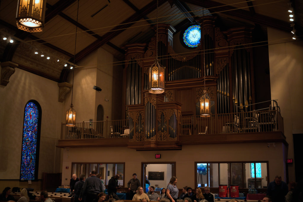 Rear of the First Presbyterian Church sanctuary, pipe organs on display, during YMCA 150th anniversary.