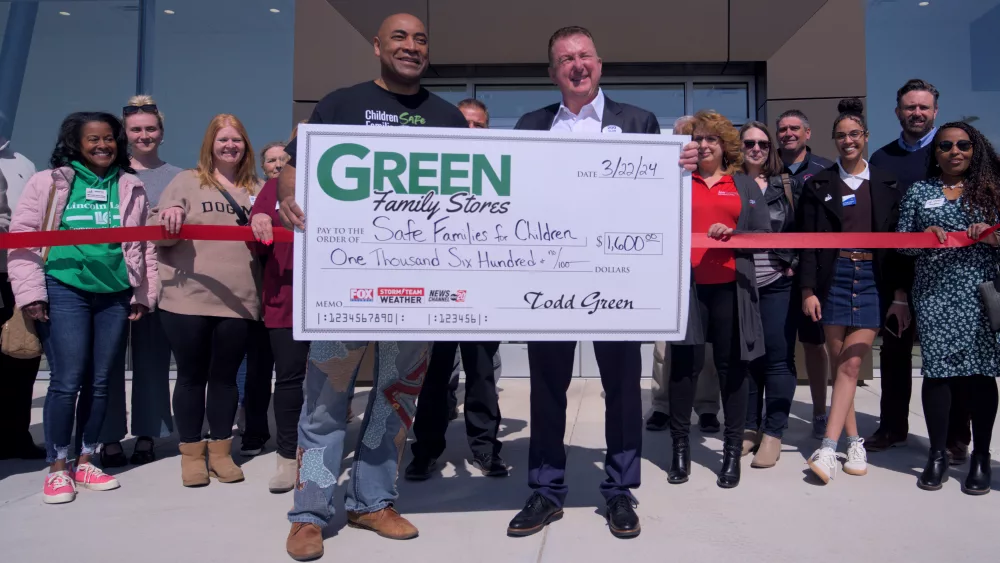 Green Family Stores Hyundai dealership ribbon cutting, Safe Families for Children donation