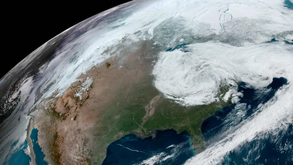 This satellite image provided by NOAA shows clouds over North America on Thursday, April 4, 2024. (NOAA via AP)