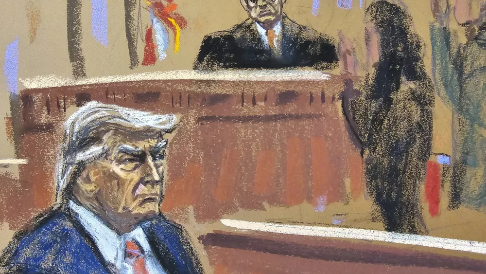Former President Donald Trump sits as final jurors are sworn in during his criminal trial on charges that he falsified business records to conceal money paid to silence porn star Stormy Daniels in 2016, in Manhattan state court in New York, Friday, April 19, 2024, in this courtroom sketch. (Jane Rosenberg via AP, Pool)