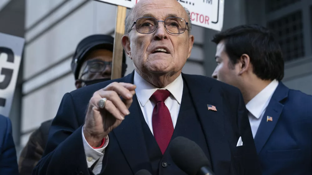 FILE - Former Mayor of New York Rudy Giuliani speaks during a news conference outside the federal courthouse in Washington, Dec. 15, 2023. Arizona attorney general Kris Mayes says Giuliani has been served an indictment in the state’s fake elector case alongside 17 other defendants for his role in an attempt to overturn former President Donald Trump’s loss to Joe Biden in the 2020 election. Mayes posted the news regarding the Trump-aligned lawyer on her X account late Friday, May 17, 2024. (AP Photo/Jose Luis Magana, File)