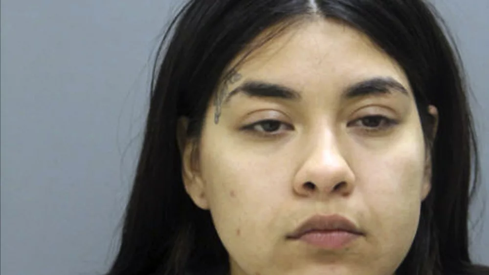 This booking photo provided by the Chicago Police Department, Thursday, May 16, 2019, shows Desiree Figueroa, who is charged in the death of 19-year-old expectant mother Marlen Ochoa-Lopez. Figueroa, who pleaded guilty to helping her mother kill Ochoa-Lopez in 2019 before the baby was cut from her womb with a butcher knife, was sentenced Thursday, May 30, 2024, to 30 years in prison. (Chicago Police Department via AP)