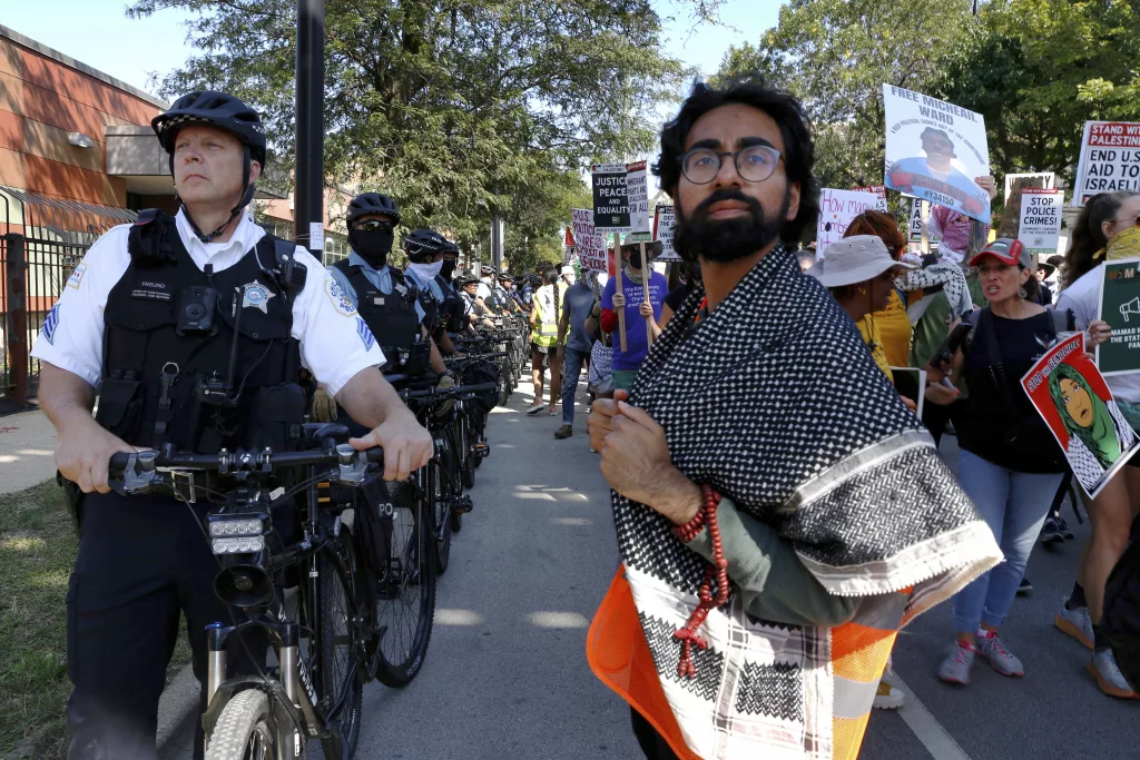 AP Portrait of a protester Outside the Democratic convention, a young