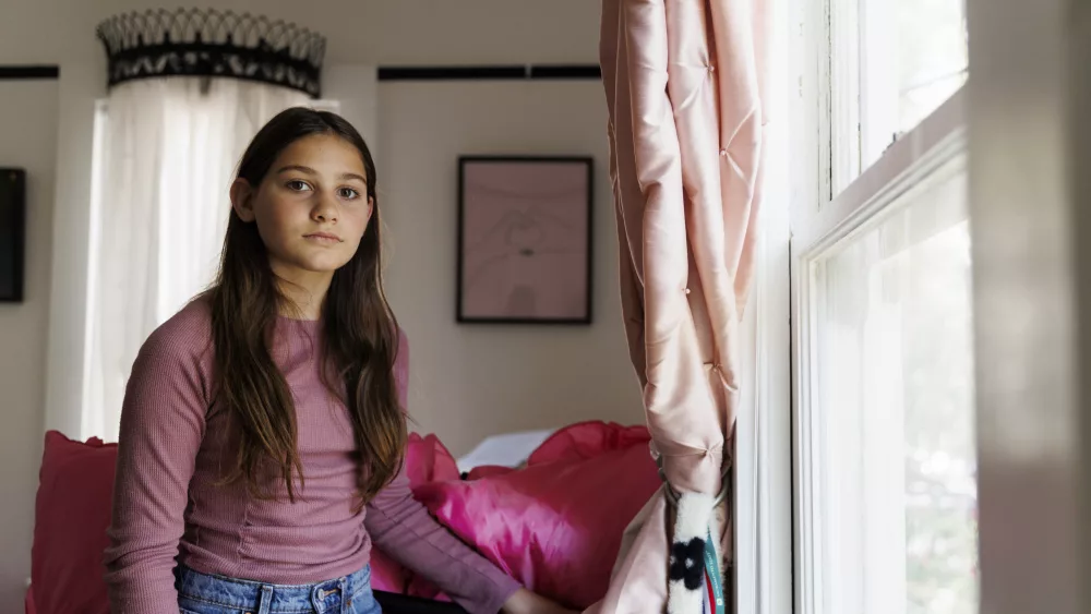 Scarlett Goddard Strahan, 11, poses for a portrait at her home on Tuesday, Aug. 20, 2024, in Sacramento, Calif. (AP Photo/Juliana Yamada)