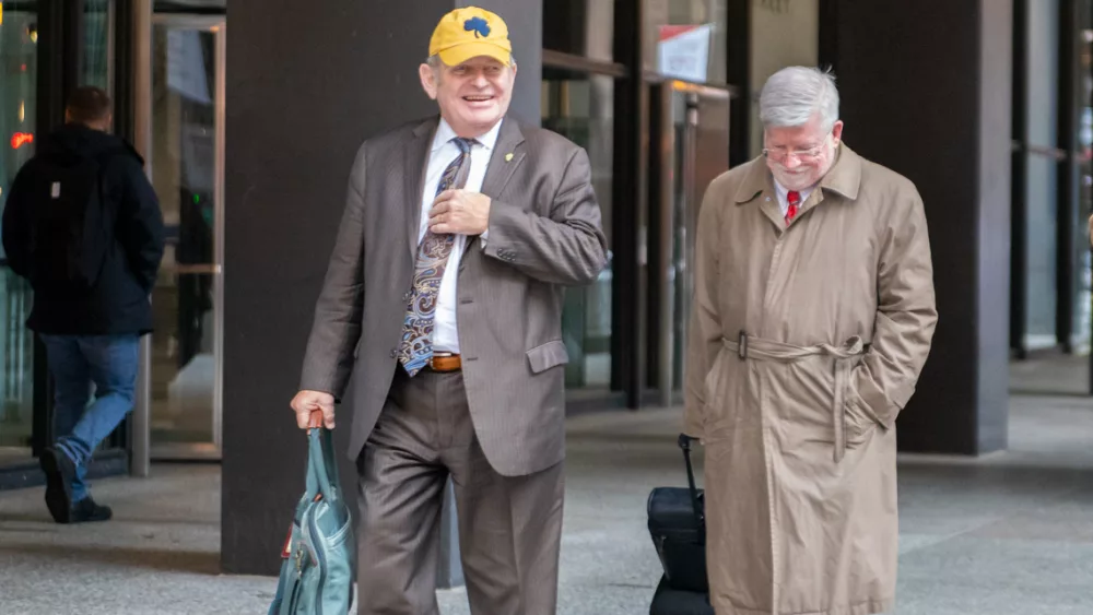 Mike McClain, the former top contract lobbyist for electric utility Commonwealth Edison, exits the Dirksen Federal Courthouse on Wednesday, Nov. 6 with his attorney Patrick Cotter. McClain is on trial alongside ex-Illinois House Speaker Michael Madigan, his longtime friend. (Capitol News Illinois photo by Andrew Adams)