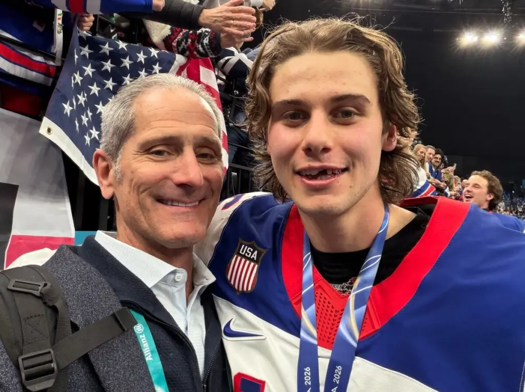 If you rooted for the USA Hockey teams in the Olympics, then you also cheered on a La Salle native who serves as Chief Medical Officer for USA Hockey.Dr. Michael Stuart, 68, graduated St. Bede Academy in 1975 and then left the La Salle-Peru area to pursue a medical career. That career led to medical roles in five Winter Olympic Games.After completing his undergraduate studies at DePauw University in Greencastle, Indiana, Stuart earned a medical degree in 1983 at Rush Medical College in Chicago. He completed a five-year residency at the Mayo Clinic in Rochester, Minnesota, followed by a sports medicine fellowship at the University of Western Ontario.He spent his entire professional career as an orthopedic surgeon at the Mayo Clinic, retiring in January 2024. He still resides in Rochester with his wife, the former Nancy Cosgrove of Peru, and has four children.Their sons, Michael, Colin and Mark, all played professional hockey, including the National Hockey League. Daughter Cristin played hockey for Division 1 Boston College. Mark is an assistant coach with the Edmonton Oilers.Stuart discussed his evolution from orthopedic surgeon and hockey dad to his expansive role with USA Hockey with Shaw Local News Network. Although Olympic medals are reserved for athletes, Stuart has two gold medals and a bronze medal from serving as the USA Hockey men’s team physician at world championships.How exciting was it to be there in Milano Cortina for the men’s and the women’s victories? Tell me about the atmosphere.Stuart: The atmosphere at the Santagiulia arena in Milano was incredible. The energy level, the quality of the competitions, and the overtime victories by both the USA women’s and men’s team in their gold medal games were outstanding. I have a very personal relationship with USA Hockey as the Chief Medical Officer and have served as the USA Hockey men’s team physician at multiple World Championships, the World Cup of Hockey, and the Olympic Games.These victories in Milano were especially meaningful for me, since I was on the USA Hockey bench as the team doctor in Vancouver in 2010, when Canada won the gold medal in overtime after Sidney Crosby scored the game-winning goal. I was also on the bench in Sochi when T.J. Oshie scored multiple shootout goals to beat the host team, Russia, and when Canada beat the USA in the semifinal game by one goal. This victory in Milano was very sweet for USA Hockey, because it’s been 46 years since the 1980 Miracle on Ice team won gold.How did you come to be involved in Olympic hockey?Stuart: I got involved as a team doctor for USA Hockey way back in 1990, and I’ve been traveling with USA Hockey teams ever since. I then took over as the Chief Medical Officer. I chair the USA Hockey’s Safety and Protective Equipment Committee and oversee all the safety and injury prevention initiatives. I am also a member of the International Ice Hockey Federation (IIHF) Medical Committee, the only person from the United States. We strive to improve safety for the sport of ice hockey throughout the world.I am also an IIHF Medical Supervisor for World Championships and now the Olympic Winter Games. That role is quite different. The Medical Supervisor is responsible for all aspects of medical care at the World Championships and the Olympic Games. This includes the emergency action plan, injury reporting, doping control (drug testing), and concussion spotting. This is a supervisory role where I don’t treat athletes but ensure the highest quality of care.Were you personally a hockey player or did you come from a family that followed hockey? Tell me about your familiarity with the sport.Stuart: I was a Blackhawks fan, but we didn’t have organized hockey or an indoor ice arena in La Salle-Peru. We moved to Rochester, Minnesota, in 1983 with four young children who got involved in youth hockey, and I became the team physician for the Rochester Mustangs of the United States Hockey League.Our four children went on to play Division 1 college hockey, and our three sons played professional hockey, including in the National Hockey League. I became team doctor for multiple USA hockey teams and, eventually, the chief medical officer, which led to my involvement as team doctor in world championships, the World Cup of Hockey, and the Olympic Games.My orthopedic sports medicine career at Mayo Clinic allowed me to assemble a research team, which is still active in ice hockey and concussion research. We have published numerous articles on the safety of ice hockey, including injury epidemiology, facial protection, and concussion prevention. I have enjoyed a long career as a hockey dad, a hockey fan, a hockey doctor, a hockey researcher, and now a hockey supervisor.Is this a full-time endeavor for you now, or are you still an active physician in private practice?Stuart: I am retired from Mayo Clinic, so I no longer see patients or do surgery. My life now is centered around our four children, 11 grandchildren, friends, and spending time at our lake cabin. But I remain very active, leading a Mayo Clinic hockey research team and working for both USA Hockey and the International Ice Hockey Medical Federation. I attend meetings and I travel extensively for World Championships and the Olympic Games. I am a volunteer and not an employee, but hockey is obviously a passion because of my long career in the sport. I now enjoy watching our grandchildren play hockey and other sports.Will you be at the next Olympics? Would you like to be there the next time the men, the men or the women compete?Stuart: That’s a good question. I certainly would like to. I guess time will tell. Four years is a long time away, but I would envision that I will still be the Chief Medical Officer for USA Hockey and hopefully still a member of the IHF Medical Committee. If I have another opportunity, I will relish it.