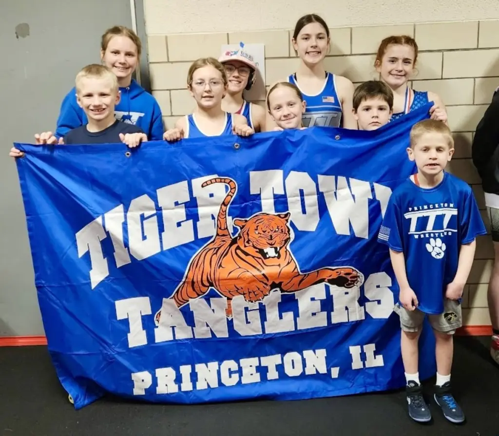 The TigerTown Tanglers have qualified eight wrestlers for the IKWF State Tournament this weekend in Peoria, including three first-time qualifiers.Easton Olson (INT 84) was first at the Rock Island Sectional, Rayelynn Hartmann (NOV 68) and Gabriella Hollars (SEN 110) were second, Scotlynn Hartmann (BAN 43), Kyra Gibson (NOV 74), Layla Rucinski (INT 115), Kaya Olson (SEN 120) placed third and Anastasia Rucinski (NOV 125) was fourth.Scotlynn Hartmann, Kaya Olson and Hollars qualified for the first time.The IKWF State Tournament will be held Friday and Saturday in Peoria.