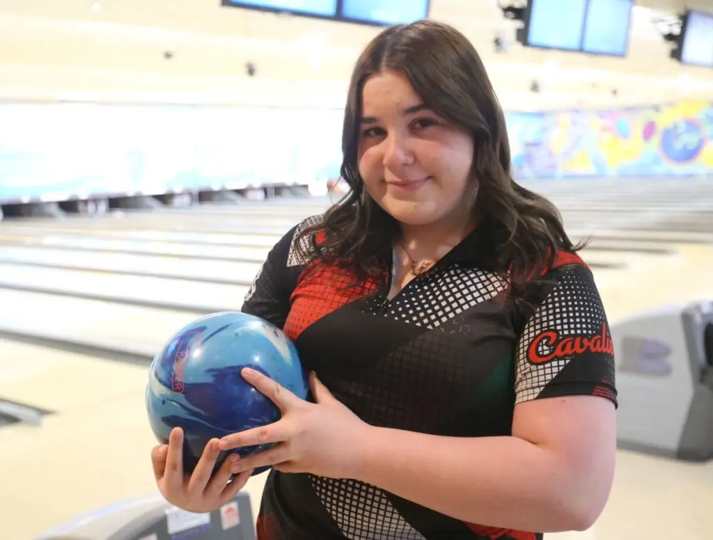 After placing eighth at the IHSA state tournament as a junior, La Salle-Peru’s Kamryn Oscepinski said she “definitely felt pressure” entering her senior season.“Pressure is a privilege is what [L-P coach Aaron] Guenther likes to say to me,” Oscepinski said. “So having that pressure really pushes me to be better. I don’t really focus on the pressure. I usually focus on what I’m doing with my team and just staying positive and just doing my best.”Oscepinski did a good job handling the pressure and had another successful season to cap her career at L-P.Oscepinski had an area-best 195.6 average, won the Interstate 8 Conference Tournament, placed top 10 at the Oregon, L-P, Charles Butterfield and Belvidere North invitationals, won the La Salle-Peru Regional, placed fourth at the Harlem Sectional and finished 40th at state.For all she accomplished this season, Oscepinski is the 2025-26 NewsTribune Girls Bowler of the Year.“The pressure was definitely on because last year was such a good year for me,” Oscepinski said. “But I think it’s not about trying to be better than last year, it’s just trying to keep doing your best, and I think I did that.“I had a really good season. I was really happy with how everything turned out. I think I had a good postseason. I was just really happy with how I did.”Oscepinski is the NewsTribune Girls Bowler of the Year for the second season in a row.“Kam came in with high expectations given how both she and the team finished last year, and I thought she handled that pressure well,” Guenther said. “It’s easy to do well when you’re kind of the underdog, and you don’t have high expectations, but coming in as somebody who had gotten eighth place at state, that’s going to add a whole lot of pressure to your season, and I thought she handled that well.”Oscepinski was able to handle the expectations in part because she worked on her mental game in the offseason.“Sometimes when you’re throwing bad shots or a bad game, it really takes a toll on you and what you think,” Oscepinski said. “Staying positive was probably one of the things I grew in the most. I just grew to become mentally.”Oscepinski said she was able to stay positive by focusing on her teammates rather than dwelling on her bowling between shots.Guenther said she did a particularly good job of shaking off bad shots and moving on during the conference tournament and postseason.“We always talk about wanting your game to be 80% clean, meaning you want at least a spare or strike on 80% of your frames,” Guenther said. “I think she did a better job toward the end of the season, being content with spares. I think she was able to stay in the moment a little more, accept spares and make the adjustments so the strikes would come.”Oscepinski excelled in the conference tournament with a career-high 1,331 six-game series. At the regional, Oscepinski rolled a 1,267 to win the individual crown over Sterling’s Sarah Doughty, who went on to win the state title. She bowled a 1,316 at the sectional. Oscepinski had rounds of 1,185 and 1,159 at state.She also helped the Cavaliers to their fifth consecutive conference title, fourth straight regional title and fifth consecutive undefeated dual record. Her career also included two team trips to state.“From the beginning, I never thought I would be where I am today with this sport and with this team, but it really has been the best four years of my entire life,” Oscepinski said. “I’ve gotten new best friends along the way. I’ve met new people along the way from so many different schools. I’ve had different coaches who all helped me in multiple ways. I’m super grateful for the experience. I’m really sad it’s over, but all good things come to an end.”